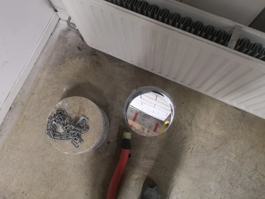 Ronde vloerdoorvoer met uitgeboorde betonkern
